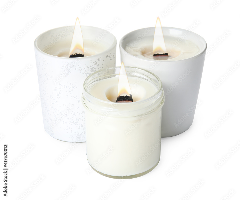 Aromatic candles with wooden wicks on white background Aromatic candles with wooden wicks on white background