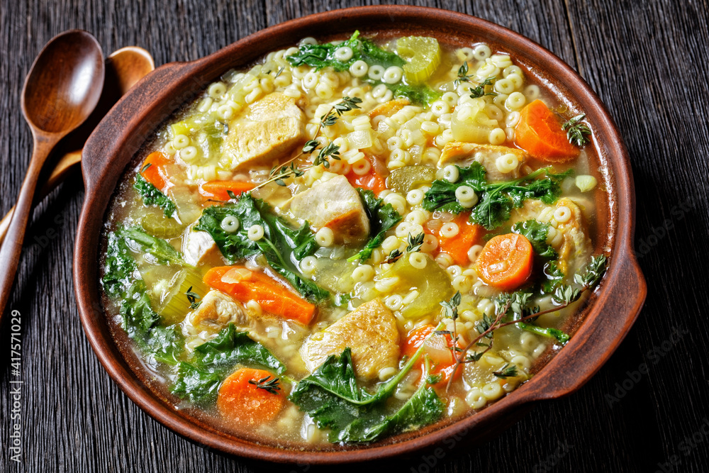 chicken kale veggies soup in a bowl chicken kale veggies soup in a bowl