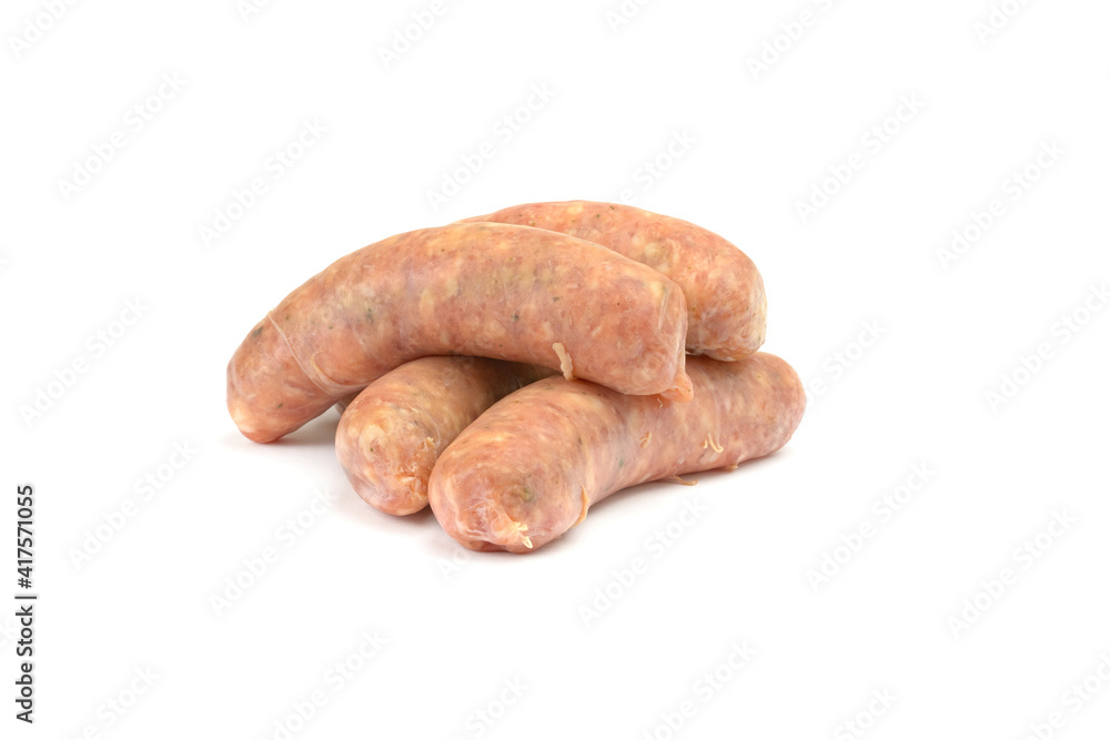 Raw pork sausages.Grilled sausages in close-up, isolated on a white background.Selective focus. Raw pork sausages.Grilled sausages in close-up, isolated on a white background.Selective focus.