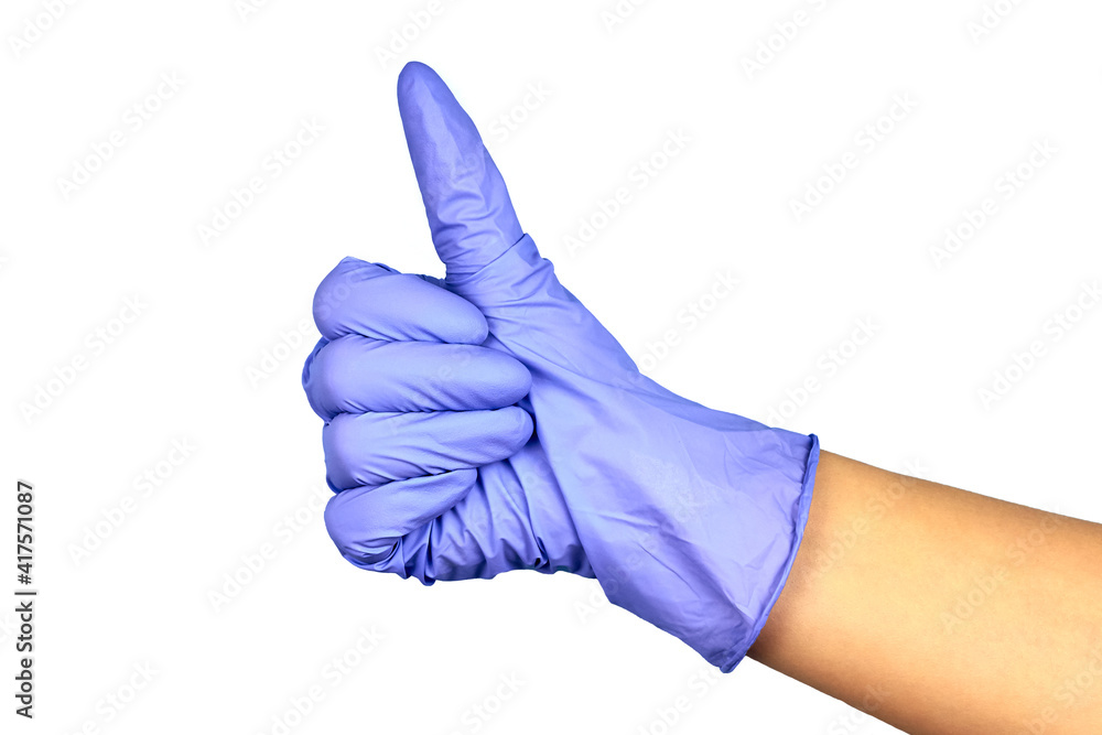 Woman's hand in a medical glove shows a gesture class.