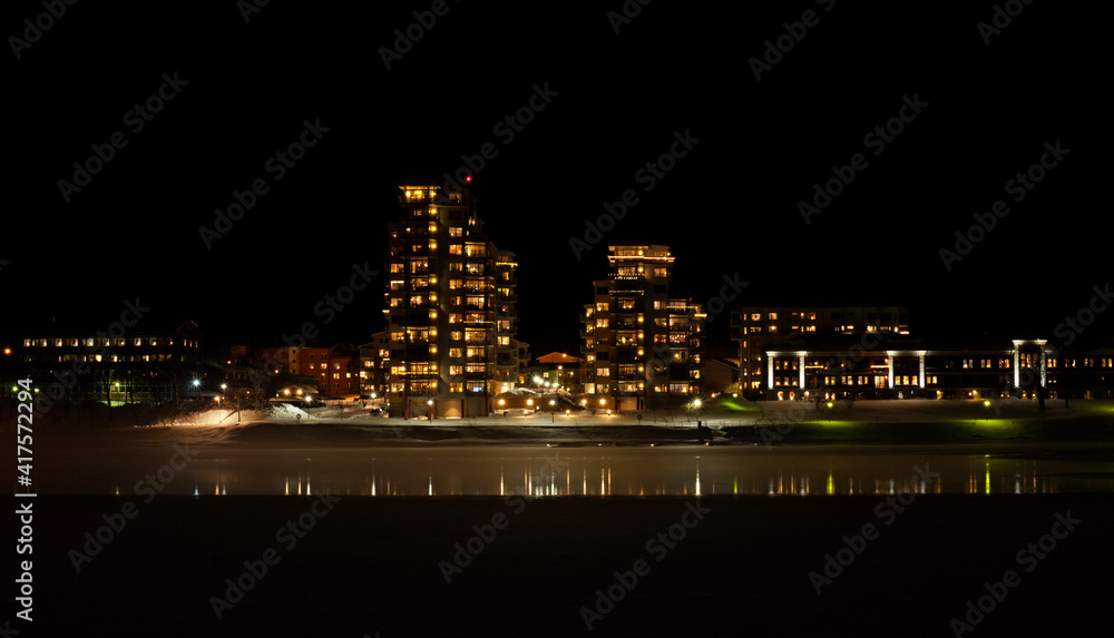 Umea, Norrland Sweden - February 10, 2021: tall houses on the other side of the river