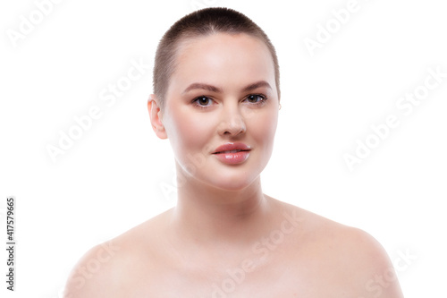 Portrait of a beautiful short-haired woman with perfect glowing skin