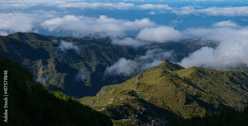 Trekking from Pico do Arieiro to Pico Ruivo. The highest mountain of the island. Hike on a sunny summer day. Beautiful landscape view. Madeira island, Portugal