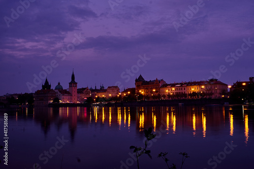 Long exposure night photography on the Vltava river in Prague, Czech Republic photo