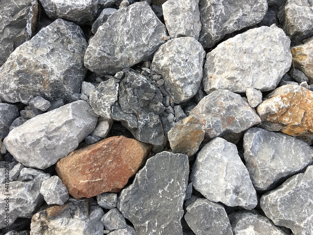 The background image of gray rocks is random stacked beautifully. The background image of gray rocks is random stacked beautifully.