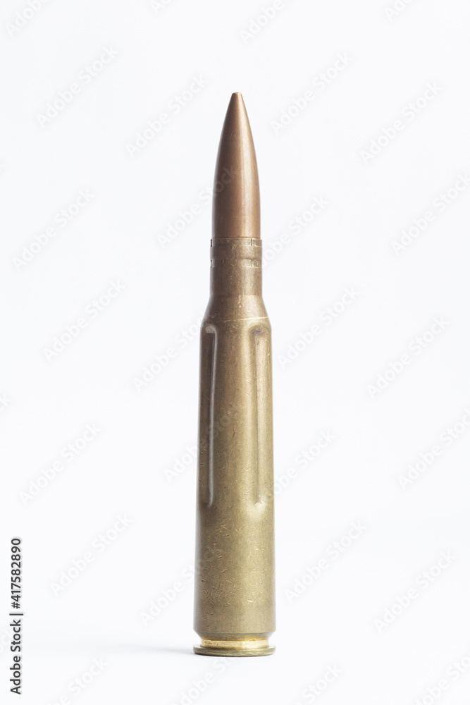 Large-caliber bullet in the background. Weapon. Picture to illustrate weapons. Large-caliber bullet in the background. Weapon. Picture to illustrate weapons.