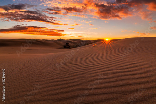 Beautiful sunset over the sand dunes in the Arabian Empty Quarter Desert  UAE. Rub  al Khali