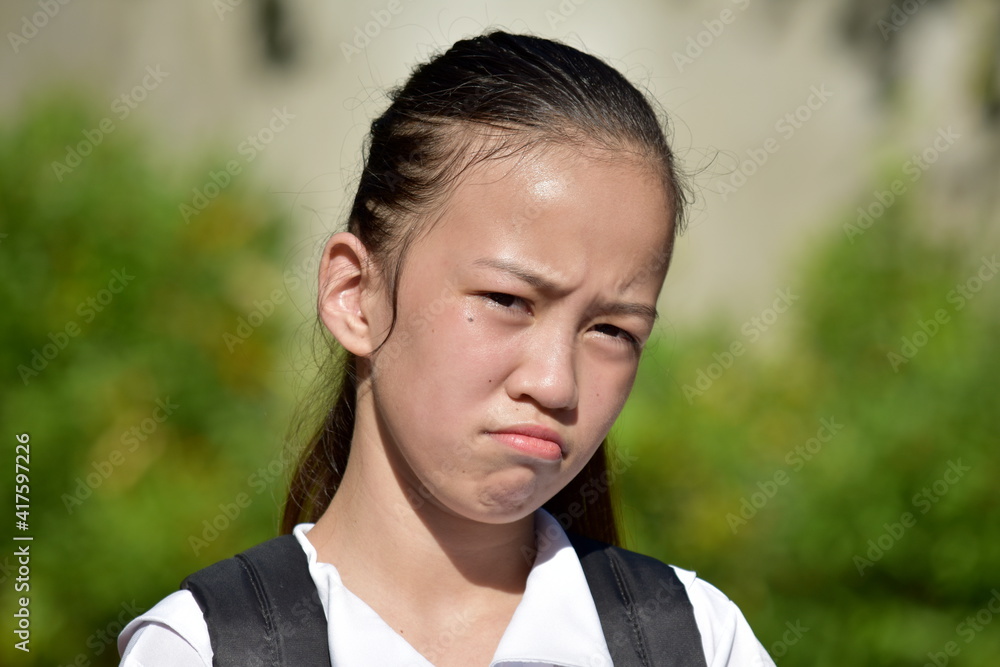 Unhappy Pretty Minority Person With Notebooks Unhappy Pretty Minority Person With Notebooks