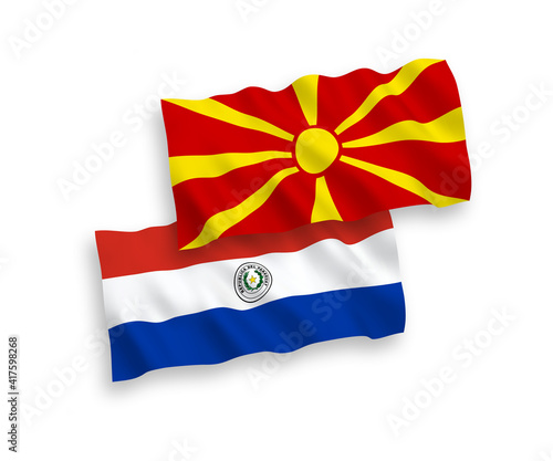 Flags of Paraguay and North Macedonia on a white background