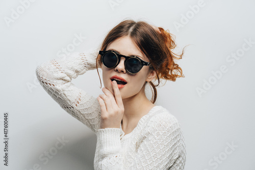 pretty woman wearing sunglasses glamor lifestyle studio modern style © SHOTPRIME STUDIO