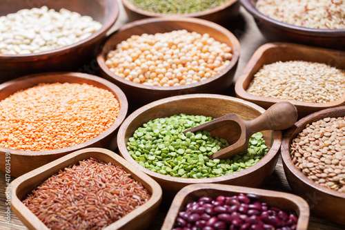 bowls of legumes, lentils, chickpeas, beans, rice and cereals