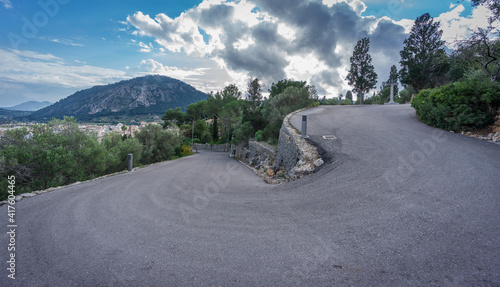 Ultra wide angle view of mountain hairpin bend curved road