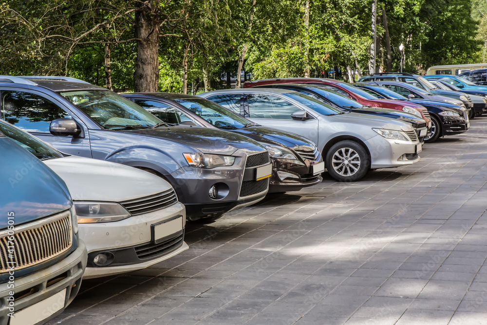 Cars in the parking lot on the street