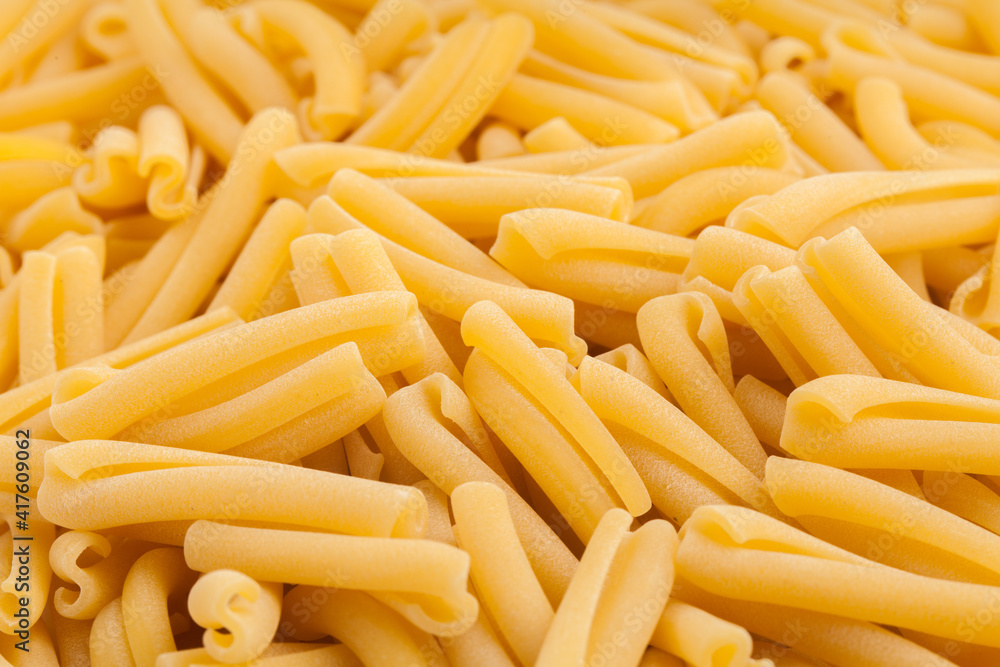 Raw Pasta texture background. High quality photo. Raw Pasta texture background. High quality photo.