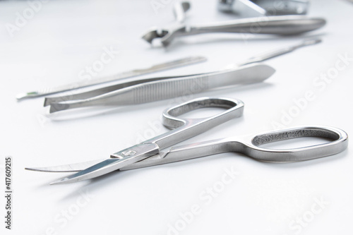 Manicure tools on white background close up