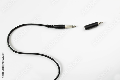 Jack plug and mini jack connector on white background