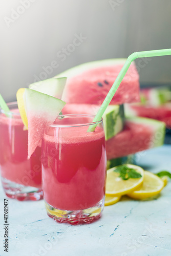 Super delicious and sweet watermelon juice on the glass. Fresh summer fruits background. Sweet watermelon slices. Watermelon fruit