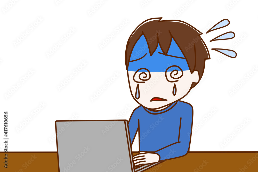 パソコンの操作が分からなくパニックになって泣いている少年