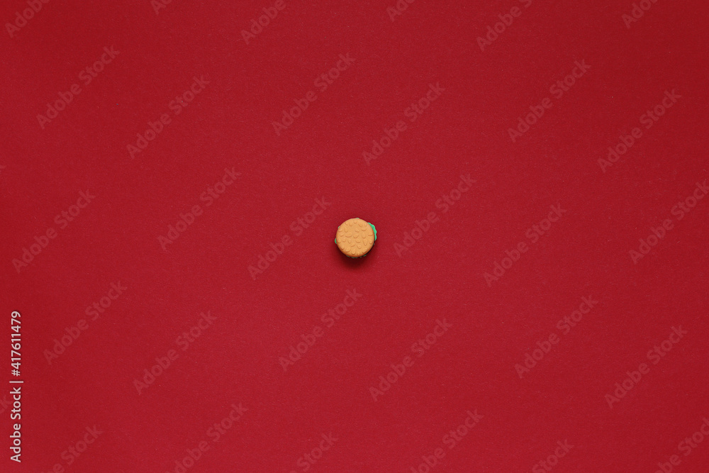 Fast food lies on a red background. Food in the background. High quality photo Fast food lies on a red background. Food in the background. High quality photo