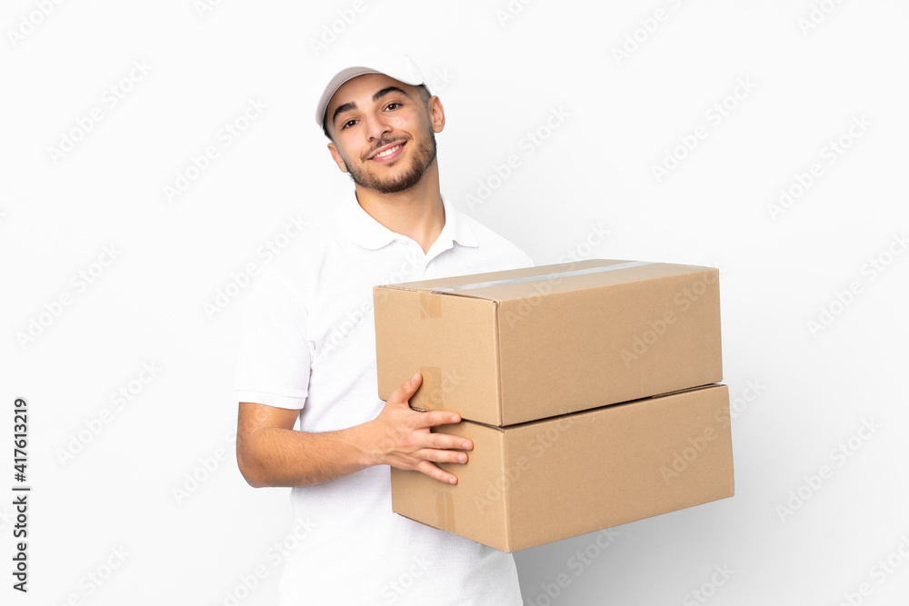 Delivery Arabian man isolated on blue background applauding Delivery Arabian man isolated on blue background applauding
