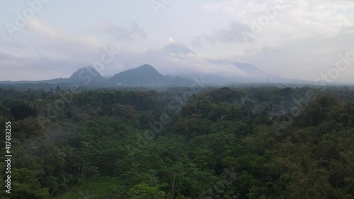 Aerial view of Mount Merapi Landscape with rice field and village in Yogyakarta, Indonesia Volcano Landscape View. photo