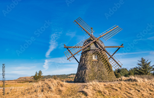 Lygnmoellen, wind mill Thacted with Heather in Western Denmark photo