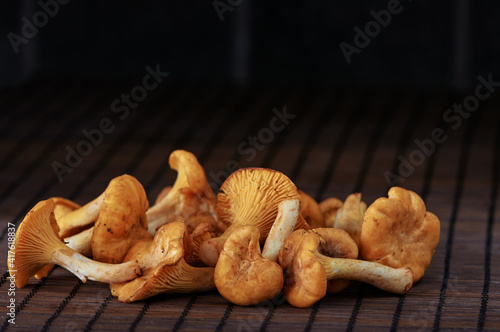 Vegetarian cuisine. Chanterelle mushrooms on the table.