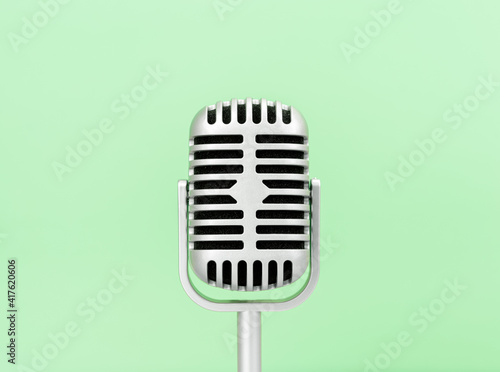 Microphone retro on green background