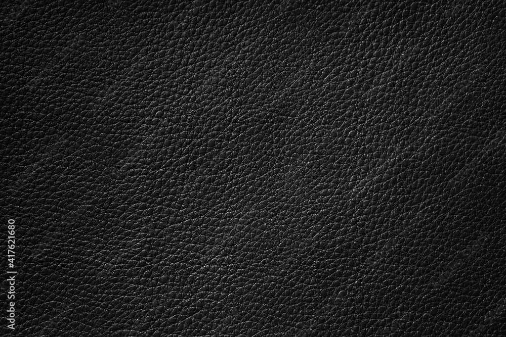 Close up of black leather texture and background Close up of black leather texture and background