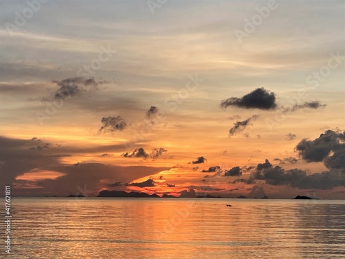 Orange sunset in Thailand over the ocean
