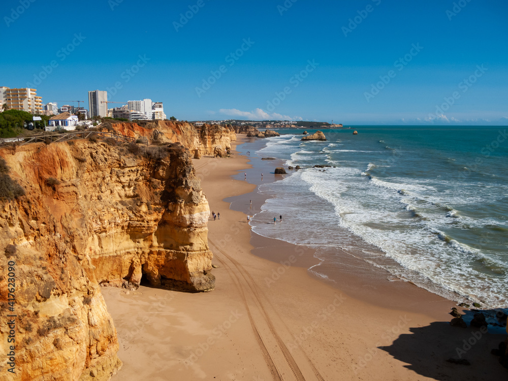 Portimao coast. Cliffs and beaches on a sunny day