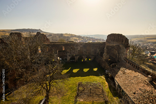 Slimnic Fortress (Stolzenburg): fortified enclosure, with towers, chapel, tower, bastion, was built in the fourteenth century, located on a Burgbasch hill on a Sibiu-Mediaș road in Transylvania photo