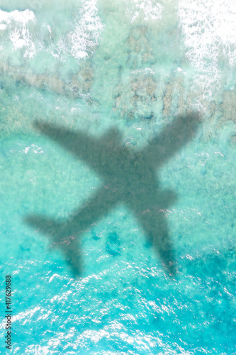 Travel traveling vacation sea symbolic picture airplane flying copyspace copy space Seychelles portrait format water