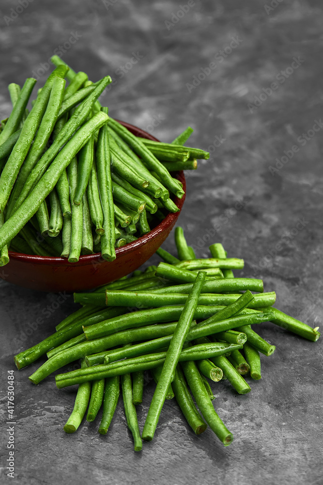 Raw food. healthy eating, close up Green diet. Super food. Vegetarianism. Green young stalks of beans. Raw food. healthy eating, close up Green diet. Super food. Vegetarianism. Green young stalks of beans.