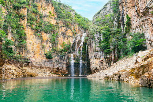Landscape of Canyons of Furnas and the waterfall, Capitólio MG, Brazil. Green water of the lake between big sedimentary rocky walls. Mar de Minas, eco tourism destination of Minas Gerais state. photo