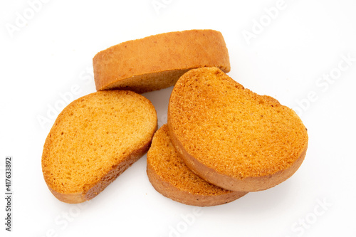 a piece of brown bread biscuit isolated on a white background