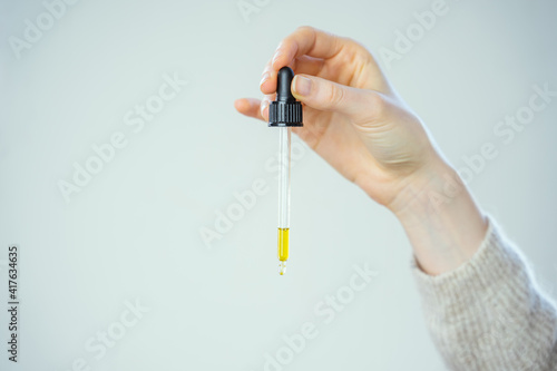 Woman Hand Holding CBD Hemp