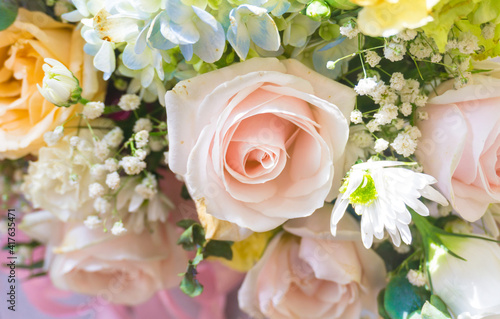 Beautiful, colorful, vibrant bouquet of flowers  roses, irises, daisies, hydrangea,.. Wedding, event, women's day concept © Leohoho