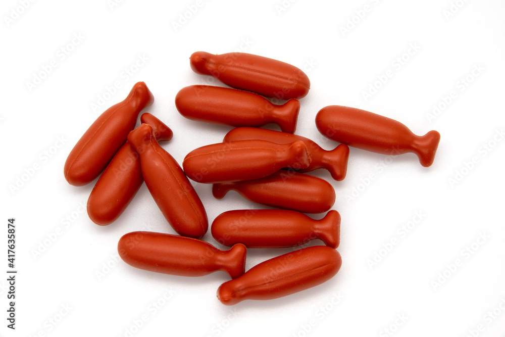 Cod liver oil omega 3 gel capsules isolated on white background Cod liver oil omega 3 gel capsules isolated on white background