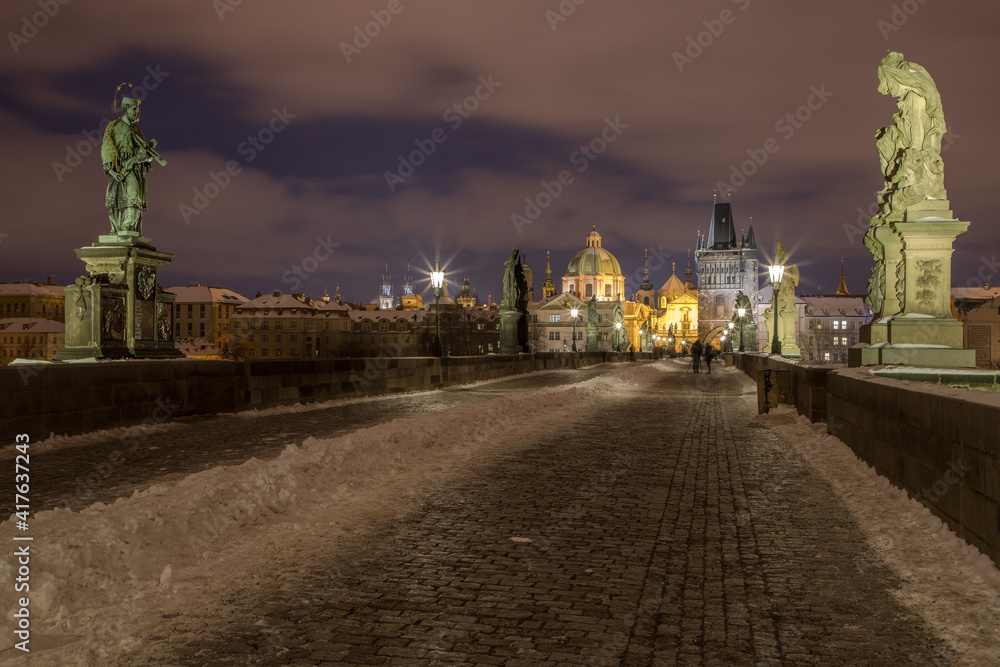 winter evening on the Charles Bridge / Prague, Czech Republic