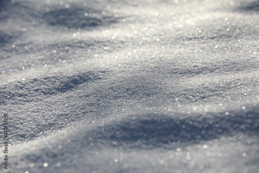 Snow close-up, winter landscape background with copy space, glittering snowflakes with bokeh effekt. Snow close-up, winter landscape background with copy space, glittering snowflakes with bokeh effekt.