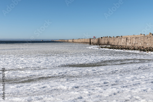 Port mole in cold spring day in Liepaja  Latvia.