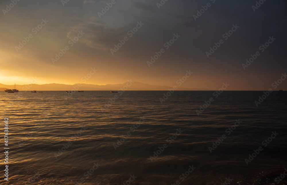 sunset over the sea located on the beach of Cachoeira do Bom Jesus, Canasvieras, Ponta das Canas, Florianopolis, Santa Catarina, Brazil, Florianópolis