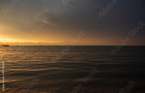 sunset over the sea located on the beach of Cachoeira do Bom Jesus, Canasvieras, Ponta das Canas, Florianopolis, Santa Catarina, Brazil, Florianópolis © Fotos GE