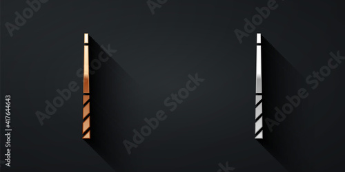 Gold and silver Billiard cue icon isolated on black background. Long shadow style. Vector.
