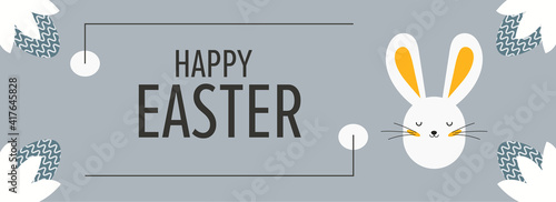 Happy Easter greeting card. Place for congratulations, white rabbit and eggs surrounded by plants