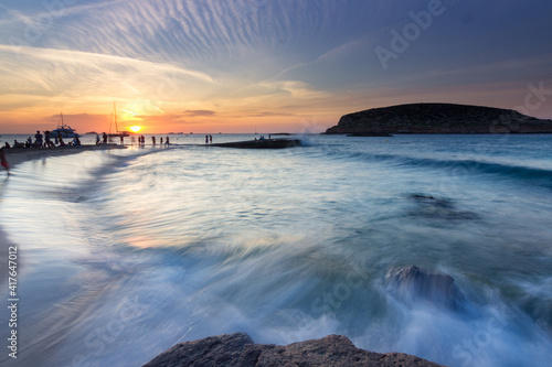 Sunset in cala Conta in Ibiza (Spain) photo