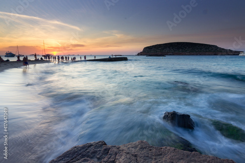 Sunset in cala Conta in Ibiza (Spain) photo