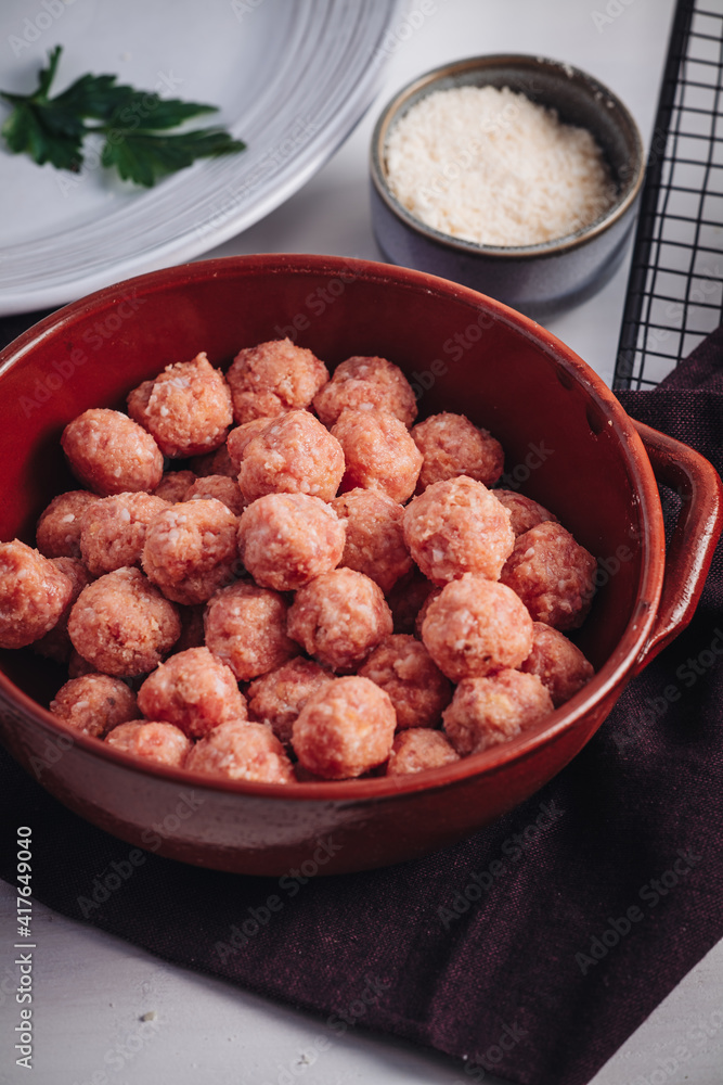 Raw home made Italian traditional meatballs Raw home made Italian traditional meatballs
