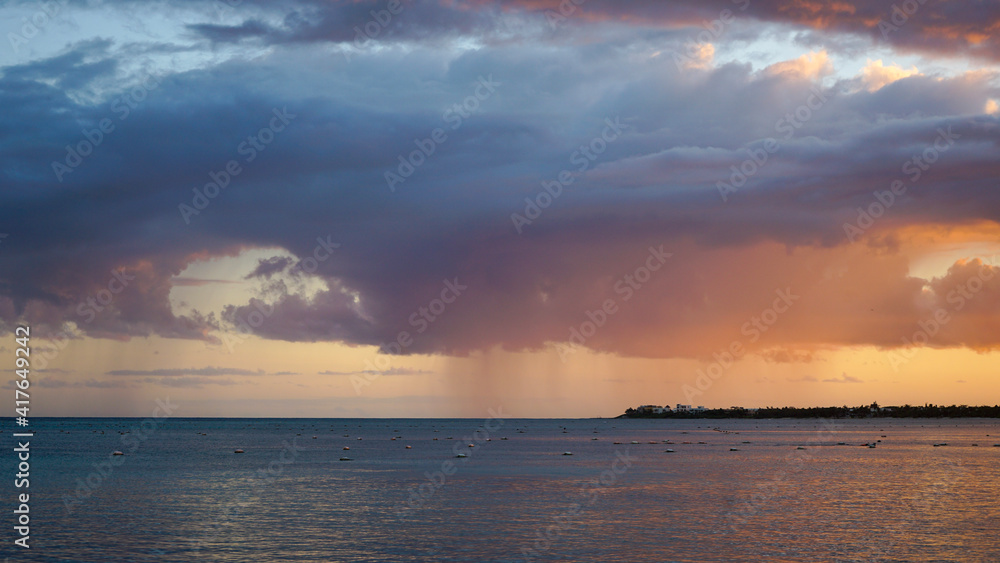 Naklejka premium sunset storm over the Caribbean sea